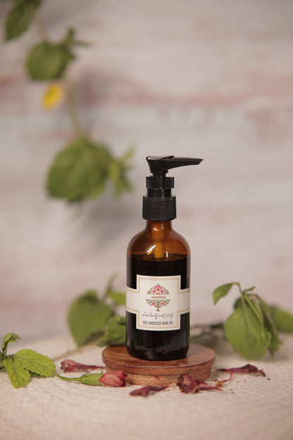 Hair Growth Magic Oil + (Free )Red Hibiscus Hair Oil
